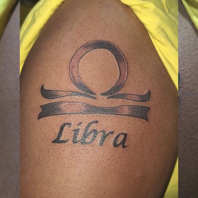 Libra symbol tattoo